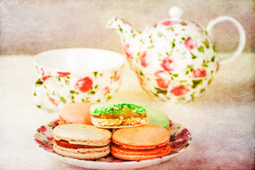 Macarons and tea set with vintage postcard style