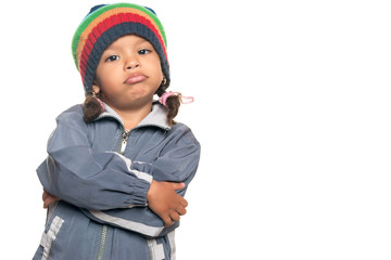 Little multiracial girl with a hip hop artist look