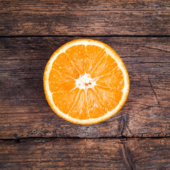 Fresh oranges on wooden background