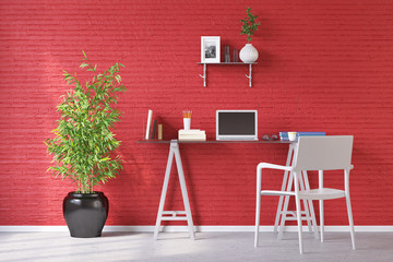 Schreibtisch mit Laptop vor roter Wand