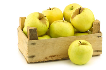 fresh "Golden Delicious" apples in a wooden crate © tpzijl