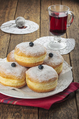 Sugary donuts and hibiscus red tea