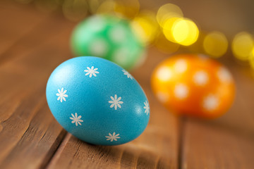 Easter eggs on wooden boards
