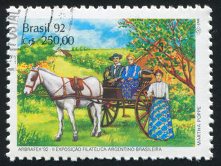 Couple in horse-drawn cart woman