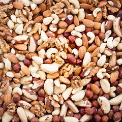 Hazelnuts, filbert on old wooden background