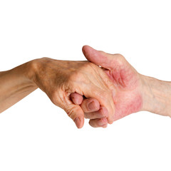 Fototapeta premium Old people holding hands. Closeup.
