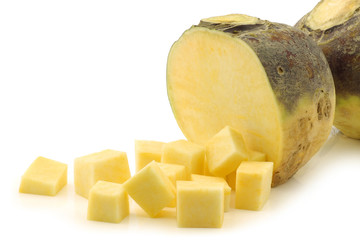 fresh turnip(brassica rapa rapa) and some cut blocks