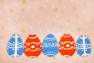Felt Easter eggs on craft paper background