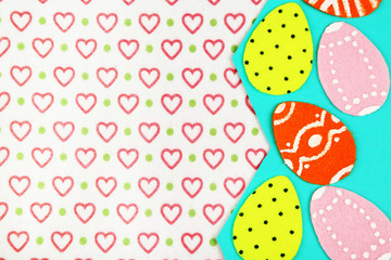 Felt Easter eggs on craft paper background