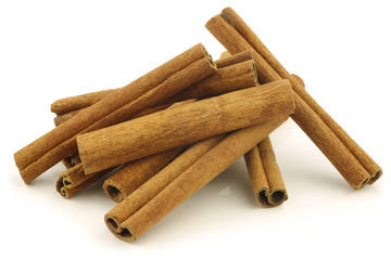 dried cinnamon sticks on a white background