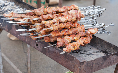 Appetizing fresh meat shish kebab (shashlik) prepared on a grill