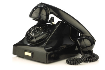 vintage bakelite telephone on a white background - obrazy, fototapety, plakaty