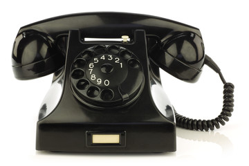 vintage bakelite telephone on a white background
