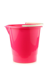 empty pink plastic household bucket on a white background