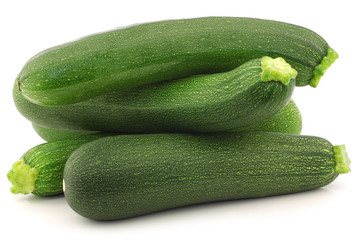 fresh zucchini's on a white background