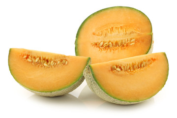 cut fresh cantaloupe melon on a white background