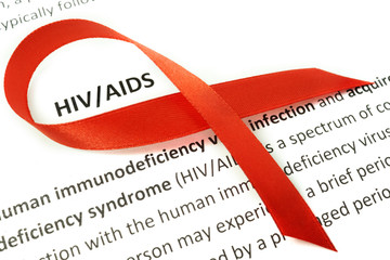 Paper with Hiv aids and red ribbon