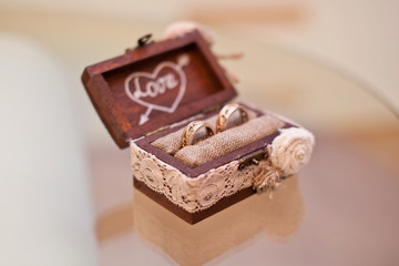 Gold rings in a vintage casket