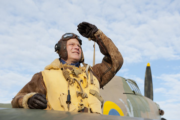 WW2 RAF Pilot With Hurricane Aircraft