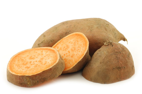 cut sweet potato on a white background