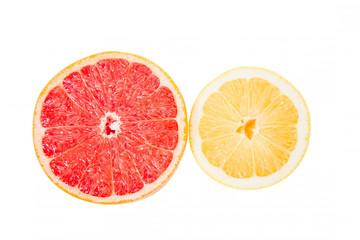 Grapefruit and lemon in a cut on a white background
