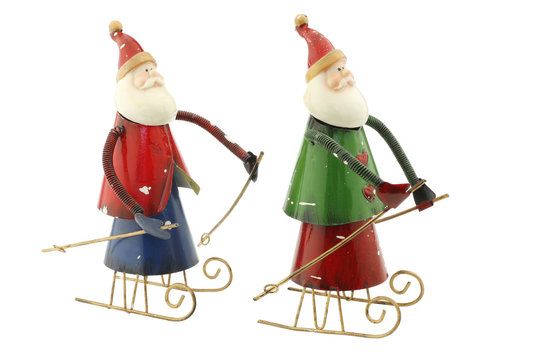 Old vintage metal Santa Claus figures on a sleigh usable for chr
