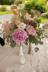 pink wedding table setting bouquet