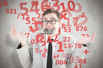 Composite image of geeky shrugging businessman biting calculator