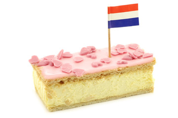 Traditional Dutch pastry called "tompouce" with pink icing