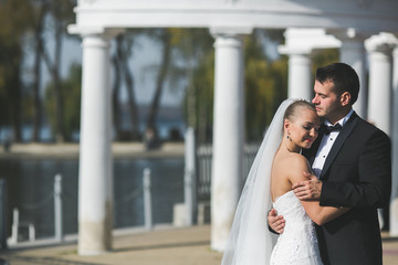 Lovely couple hugging in gorode. Europe.