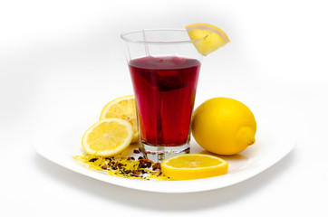 cup o tea and lemons on white background