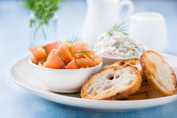 Smoked wild salmon, baguette and soft cheese with herbs