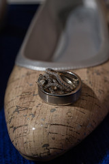 wedding band ring on cork shoe