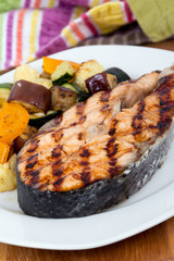 salmon fish steak meal with vegetables
