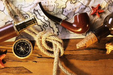 Marine still life with world map and rope