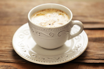 Obraz premium Cup of coffee on table close-up