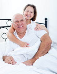 Obraz premium elderly couple in bed.