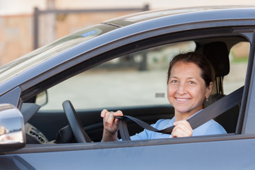 Senior woman  in   car.