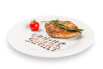 Steak on a white plate