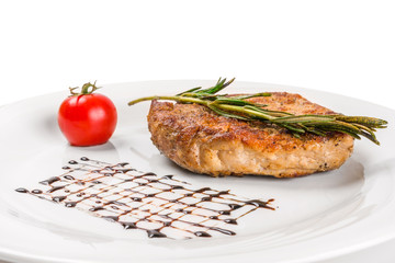 Steak on a white plate