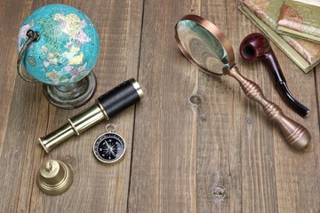 Large Group Of Travel Obgects on Grynge Wooden Table