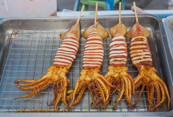 Grilled squid on the market,Thailand market.