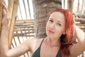 Beautiful young woman at the beach