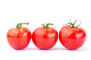 Fresh tomatoes on white background