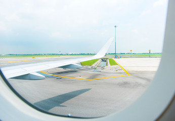 Looking through airplane window