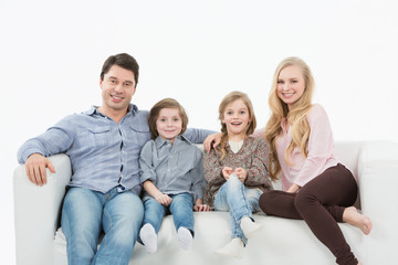 Happy family with children at home