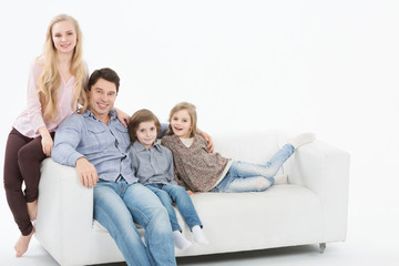 Happy family with children at home