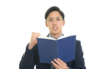 ガッツポーズのビジネスマン