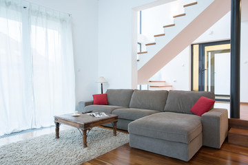 Fototapeta premium Large sofa in spacious living room