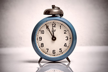 Retro alarm clock on table